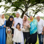muslim-family-having-good-time-outdoors-muslim-family-having-good-time-outdoors-117933332.png